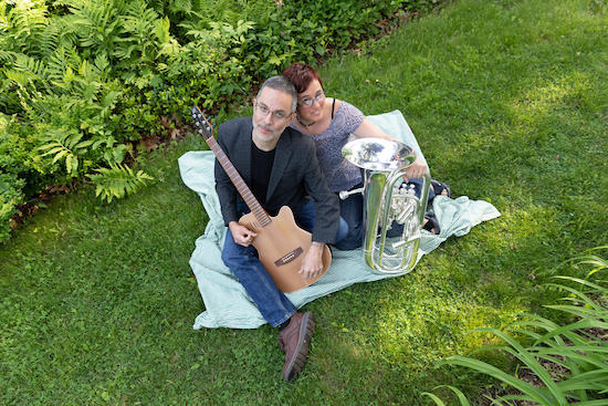 Prof. Baerman and Prof. TenEyck as their "Premier Guitar and Euphonium Duo, Stankeye Jones and the Vagabond Librarians"